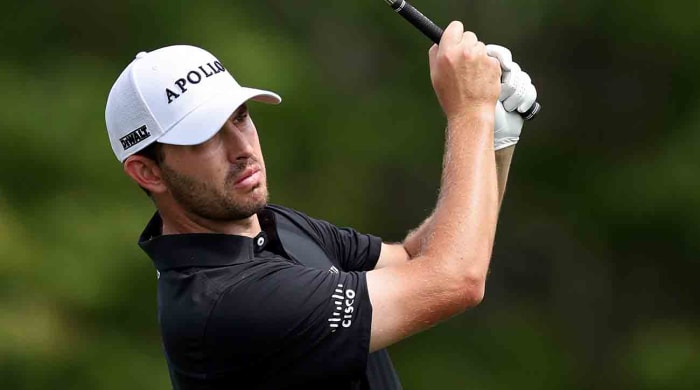 Patrick Cantlay plays a shot on the 14th hole during the third round of the 2024 Players Championship at TPC Sawgrass in Ponte Vedra Beach, Fla.